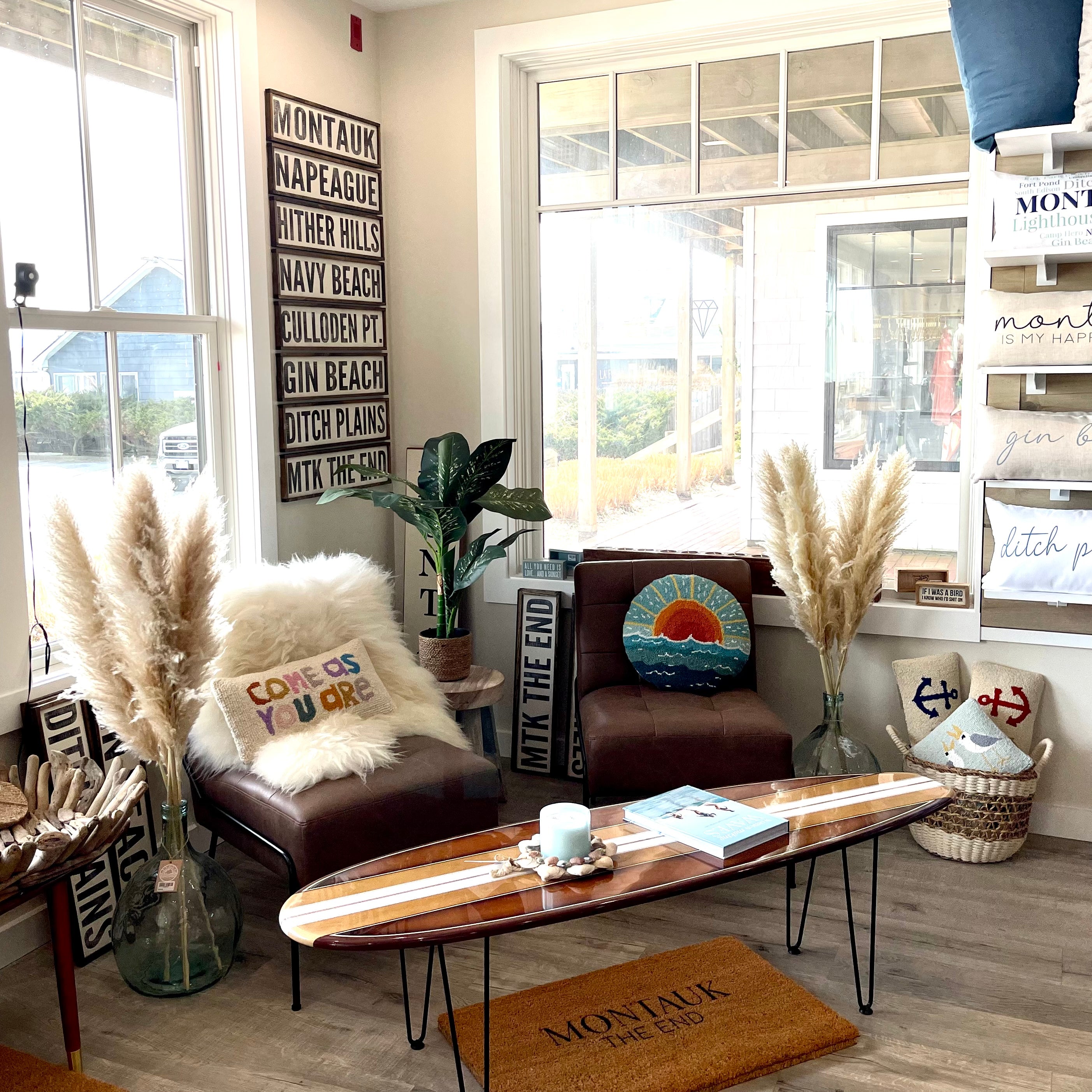 Surf Board Coffee Table, Sunset Pillow, Come as You Are Pillow, Women Making Waves Book, Lafco Candle